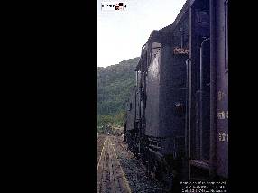 会津川口で発車を待つC11の牽く貨物。 昭和49年10月10日撮影