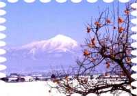 写真は雪の磐梯山です